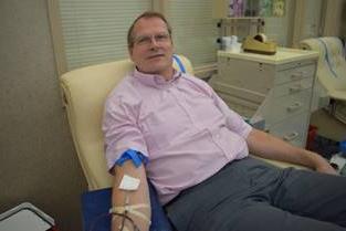 Steve Gollmer donating blood at the Community Blood Center