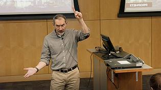 Dr. Miller teaching Old Testament Literature in a lecture hall.