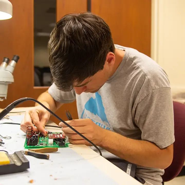 Man working on electronics